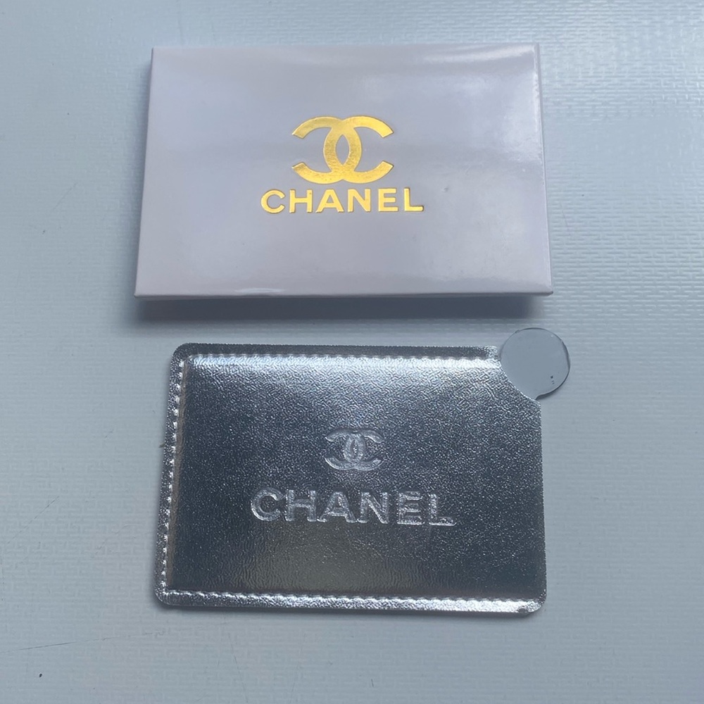 NIB Chanel like mirror slim silver